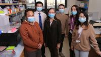 Dr. Garcia and five members of the Garcia lab pose for a picture inside the lab